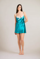Discover the 2024 summer collection of lingerie couture from the house Carine Gilson with this silk Slip Babydoll Style in Emerald green with natural lace