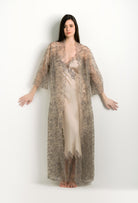 Made of silk and lace, explore the lingerie collection 2024 winter from the house Carine Gilson with this Long Kimono Raglan Style in sand beige Silk with Beige Navy lace