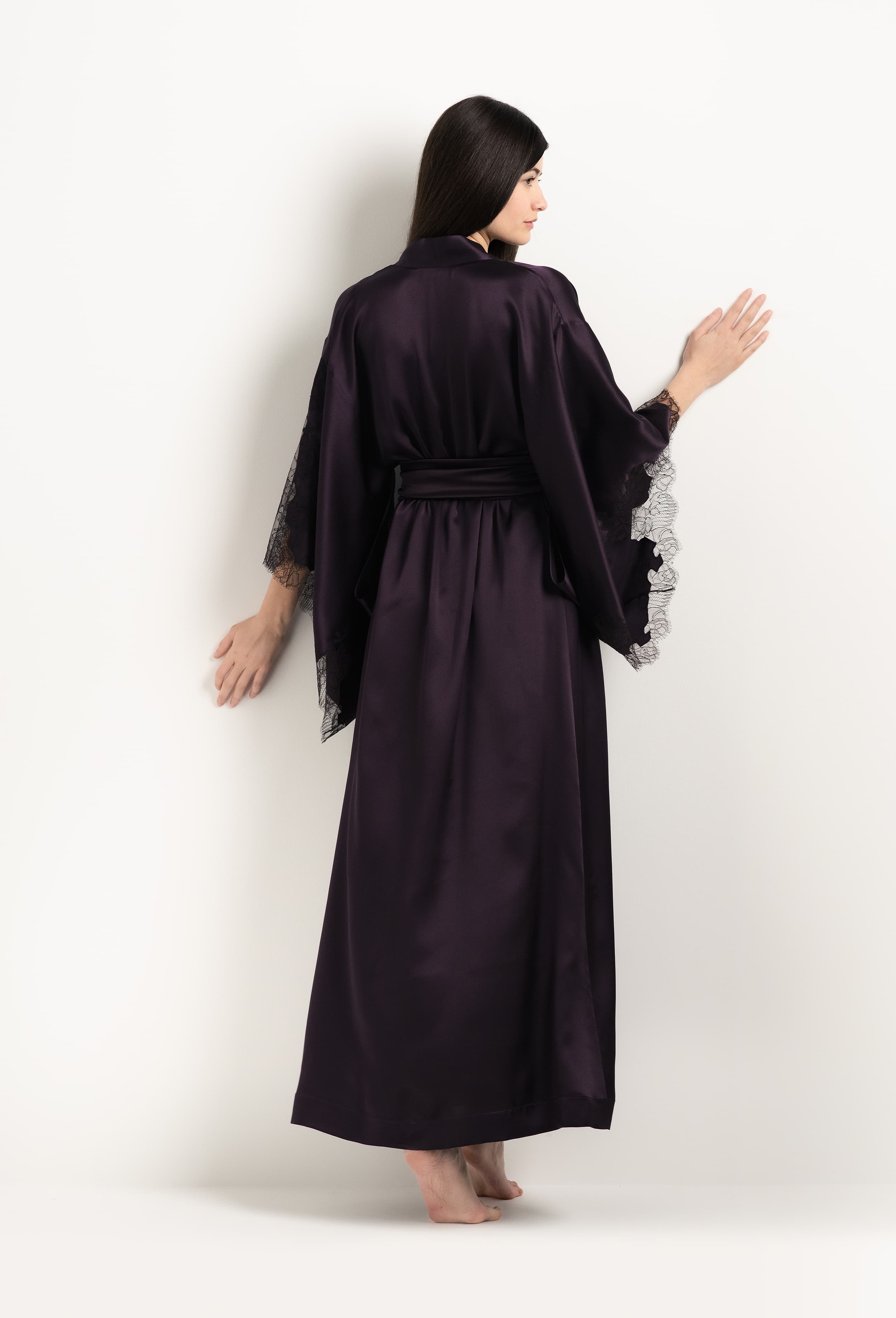 Discover the unique craftmanship of the belgian designer Carine Gilson in her atelier for the 2025 Winter collection with this Long Kimono Butterfly Sleeves in Plum Silk  with Ebony lace