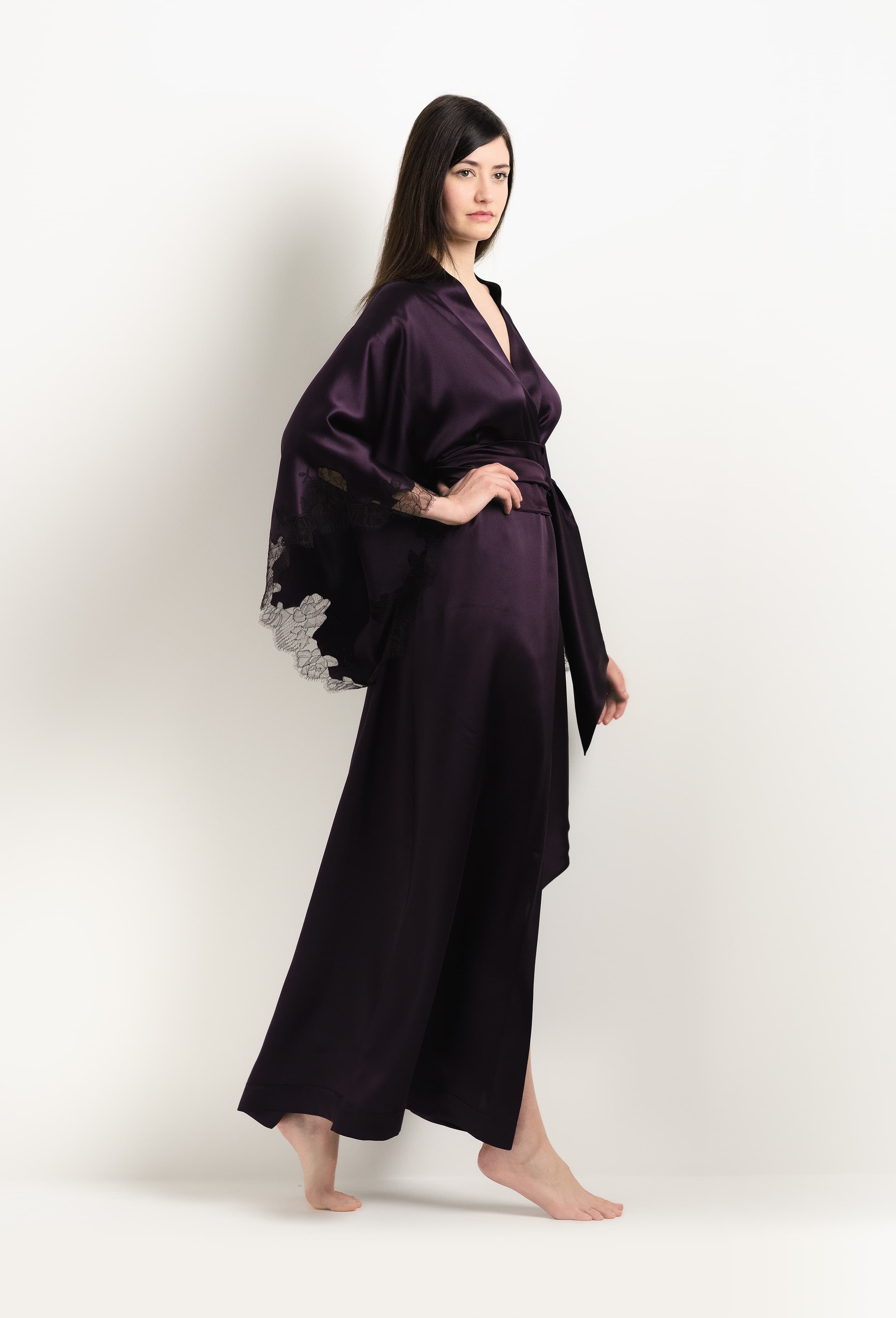 Discover the unique craftmanship of the belgian designer Carine Gilson in her atelier for the 2025 Winter collection with this Long Kimono Butterfly Sleeves in Plum Silk  with Ebony lace