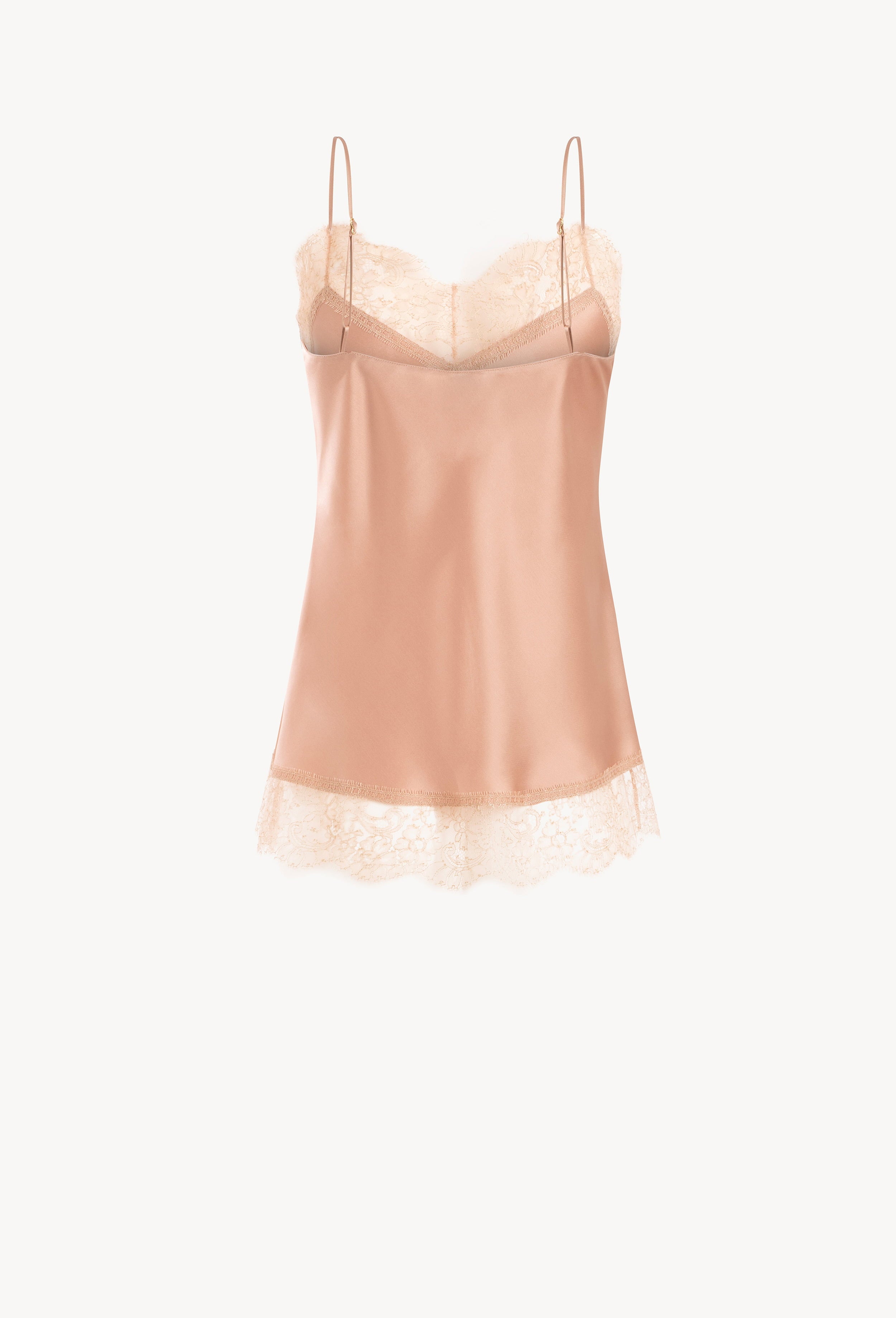 The Winter 2026-27 collection from the house Carine Gilson - The most beautiful couture lingerie to be discovered with this Long Top V Neckline with cuts in Beige vison Silk  with Beige vison lace