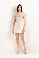 Discover the unique craftmanship of the belgian designer Carine Gilson in her atelier for the 2025 Winter collection with this Slip Babydoll Style Straight Neckline in ivory Silk  with Vison lace