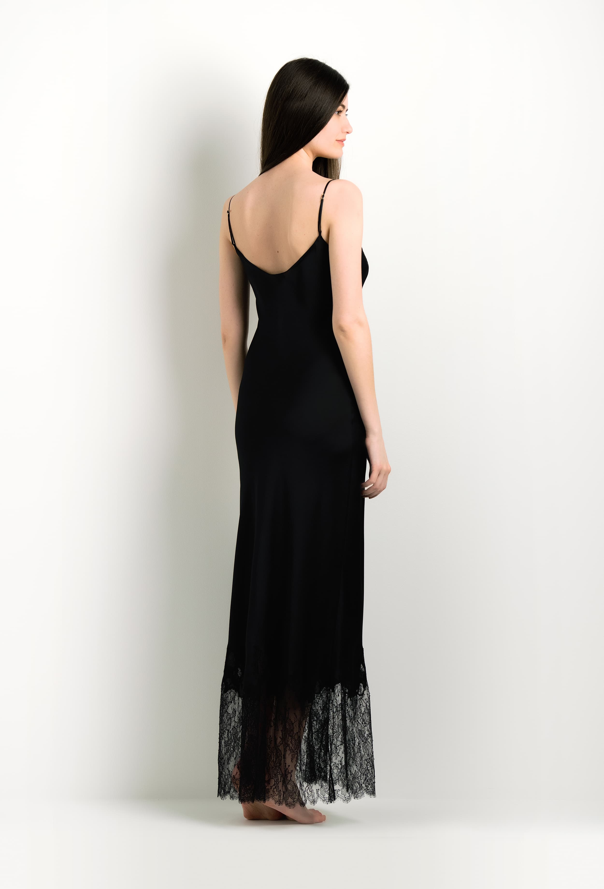 The 2024 winter collection from the house Carine Gilson - The most beautiful couture lingerie to be discovered with this Long Gown V Neckline in Black Silk with Black lace