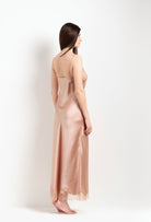 Discover the unique craftmanship of the belgian designer Carine Gilson in her atelier for the Winter 2026-27 collection with this Long Dress Straight Neckline in Beige vison Silk  with Beige vison lace