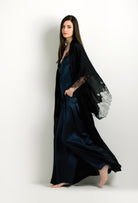 Enter Carine Gilson's world and the most beautiful silk lingerie with the 2024 winter collection and this Long Kimono Butterfly Sleeves in Black Silk with Black lace