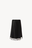 Discover the unique craftmanship of the belgian designer Carine Gilson in her atelier for the Winter 2026-27 collection with this Skirt in black Silk  with black lace