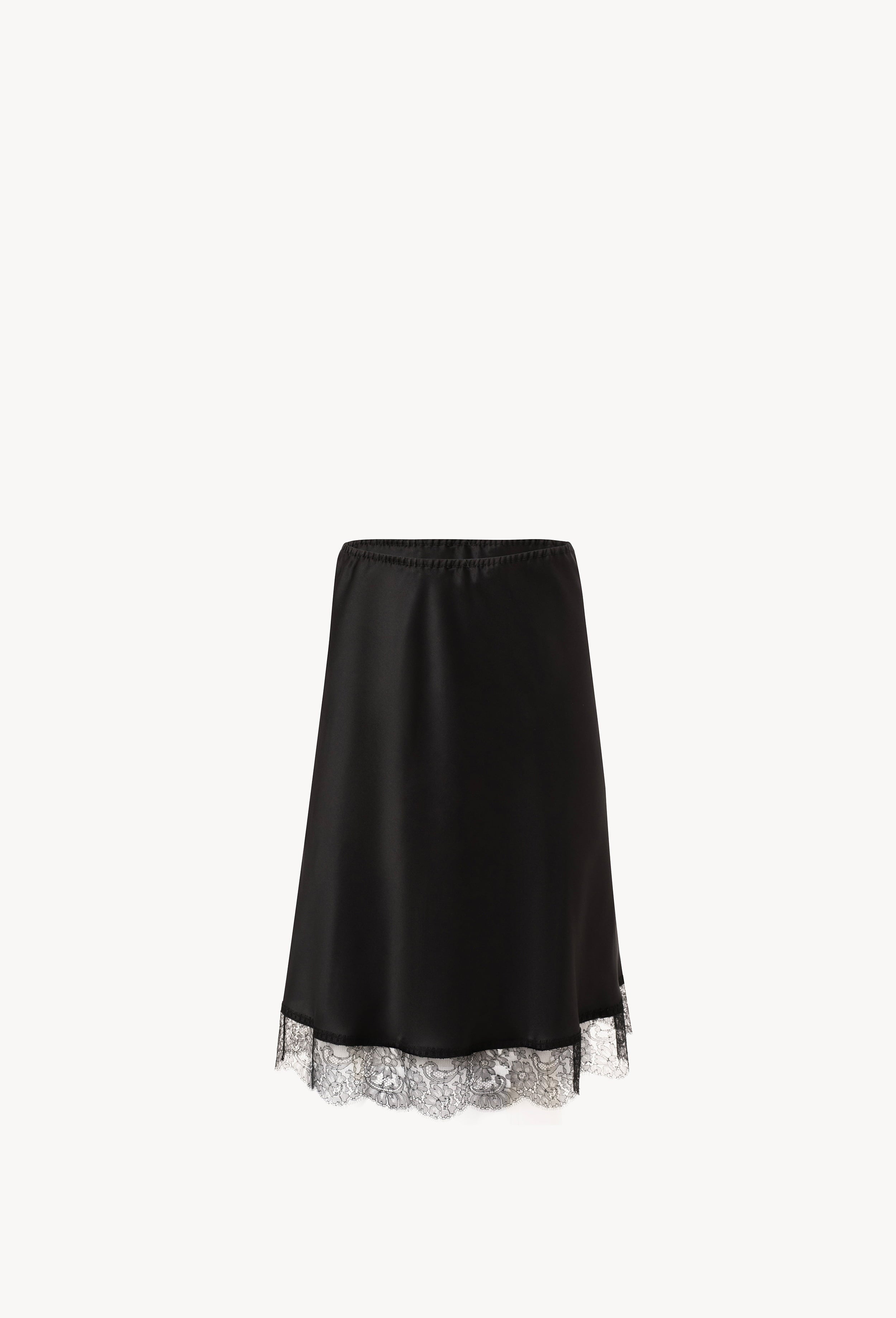 Discover the unique craftmanship of the belgian designer Carine Gilson in her atelier for the Winter 2026-27 collection with this Skirt in black Silk  with black lace