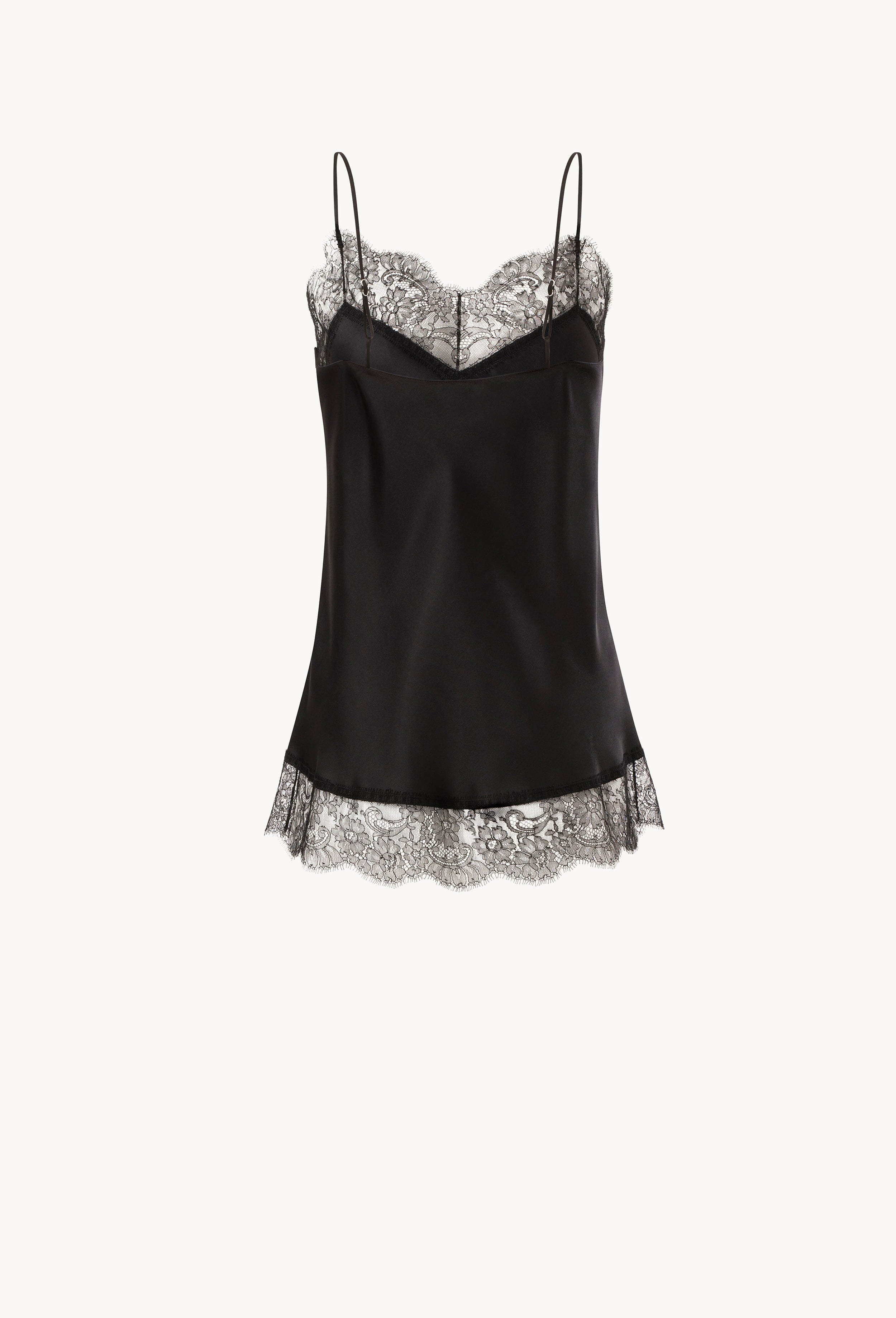 The Winter 2026-27 collection from the house Carine Gilson - The most beautiful couture lingerie to be discovered with this Long Top V Neckline with cuts in black Silk  with black lace
