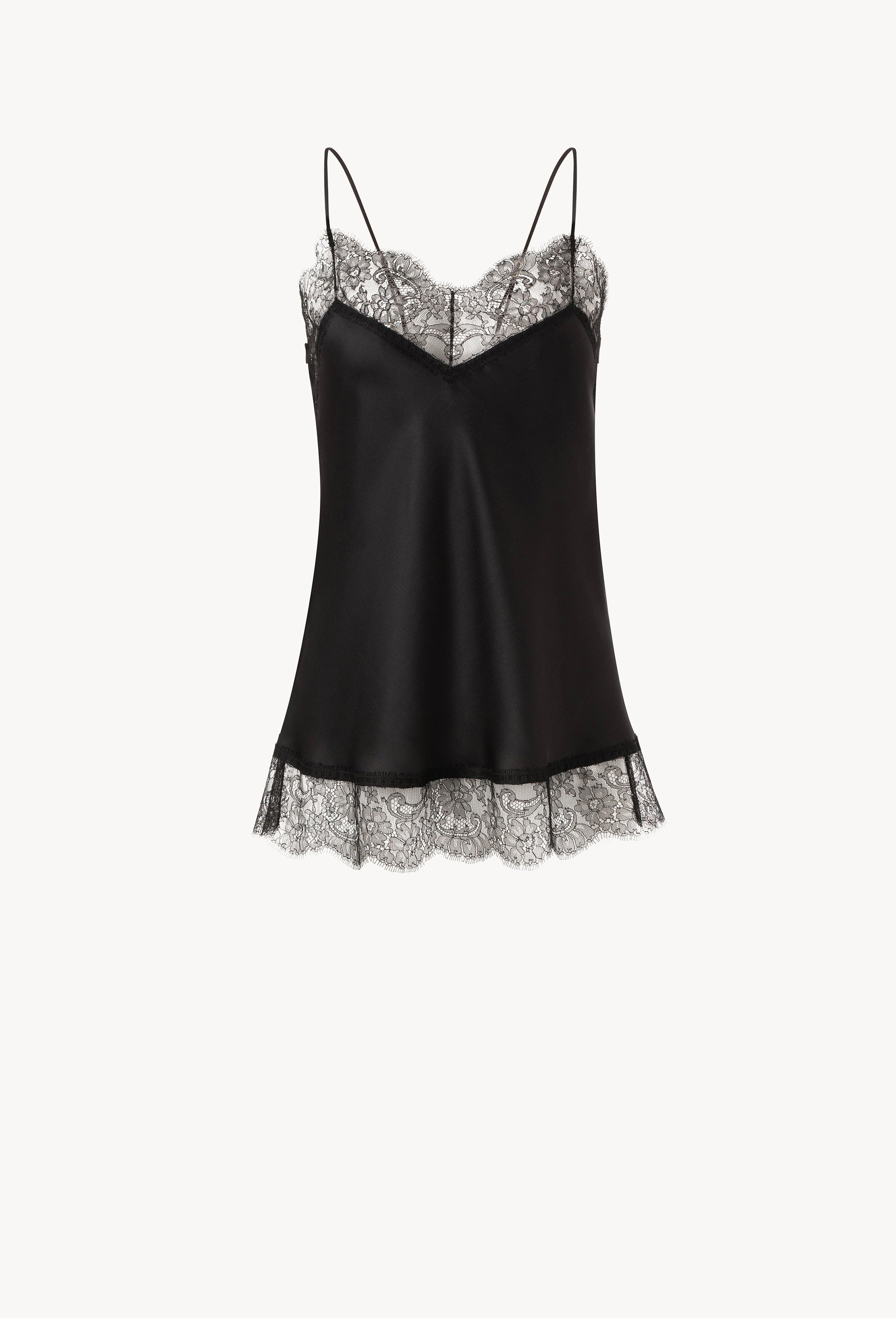 The Winter 2026-27 collection from the house Carine Gilson - The most beautiful couture lingerie to be discovered with this Long Top V Neckline with cuts in black Silk  with black lace