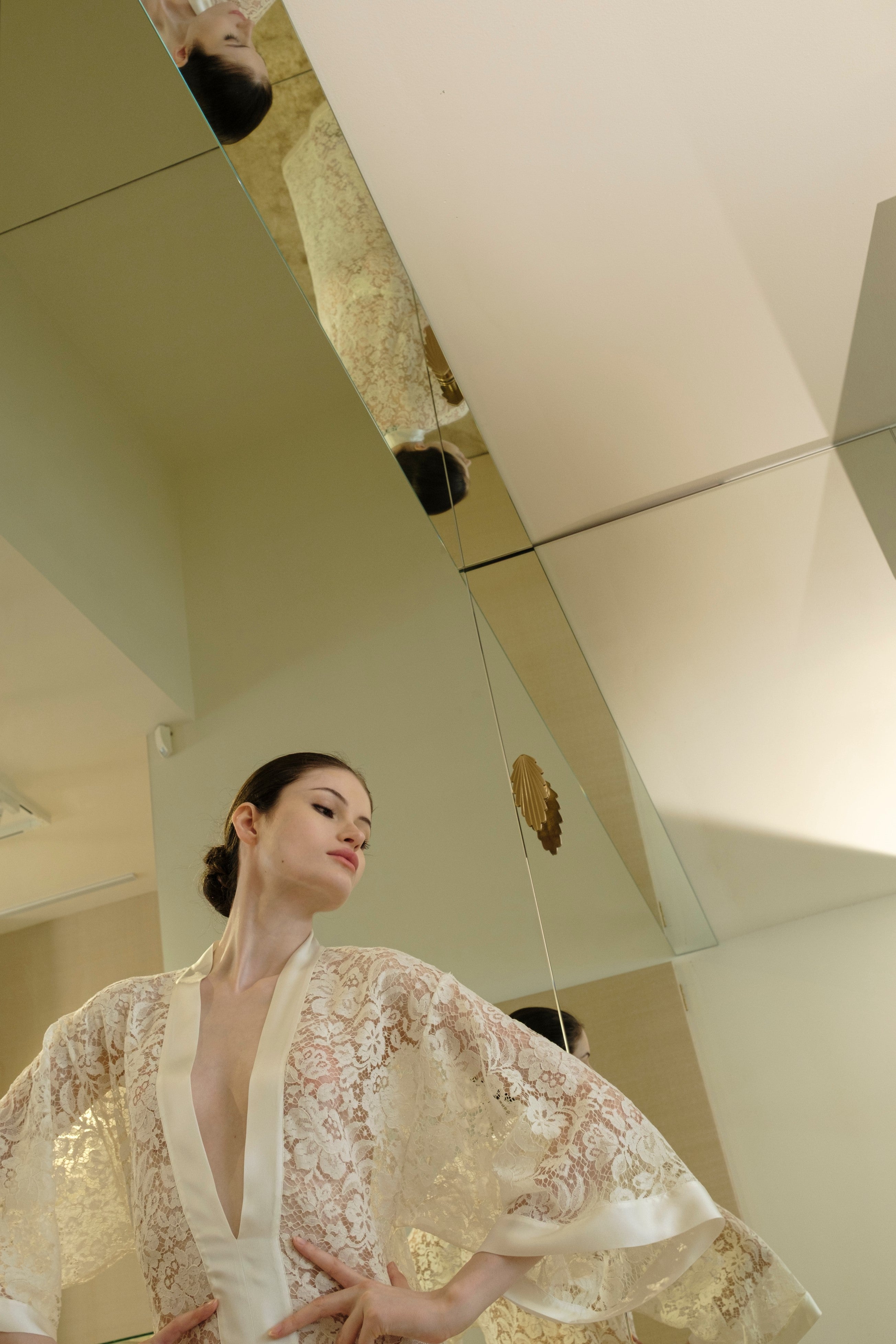 Discover the 2026 Cruise collection of lingerie couture from the house Carine Gilson with this long v neck kaftan in natural silk  with natural lace