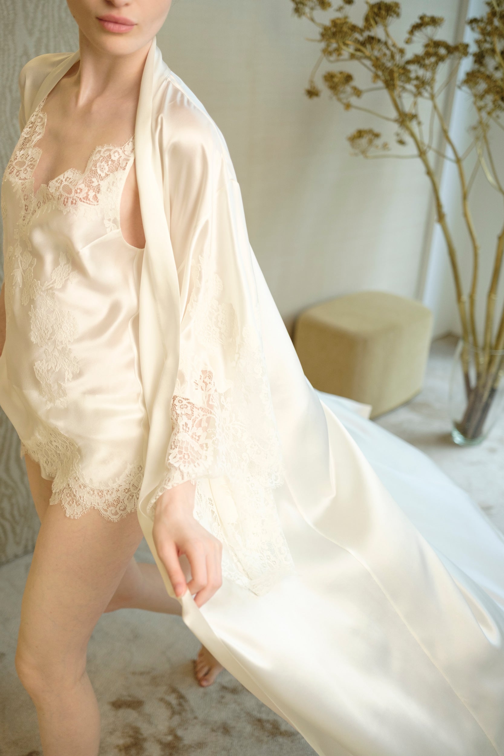 The 2026 Cruise collection from the house Carine Gilson - The most beautiful couture lingerie to be discovered with this slip babydoll style v neckline in natural silk  with natural lace