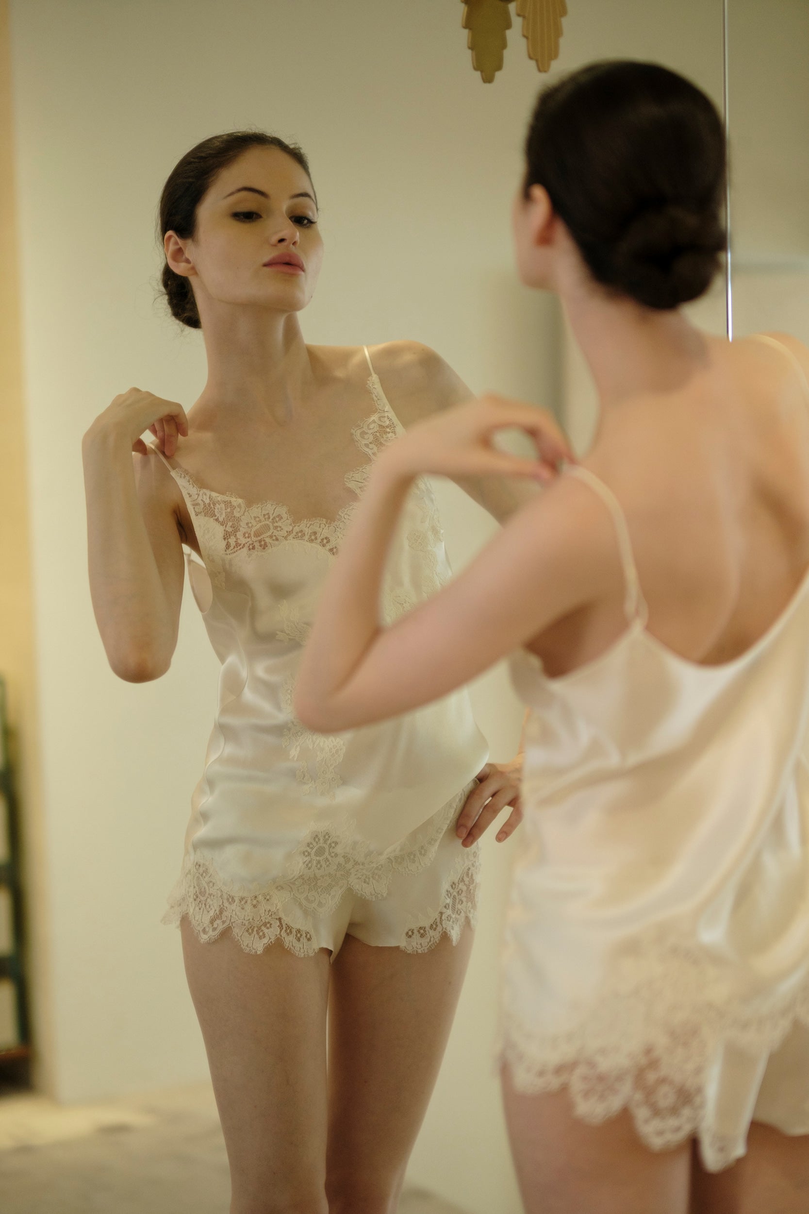 Enjoy the 2026 Cruise collection of lingerie couture from the house Carine Gilson with this camisole v neckline in natural silk  with natural lace