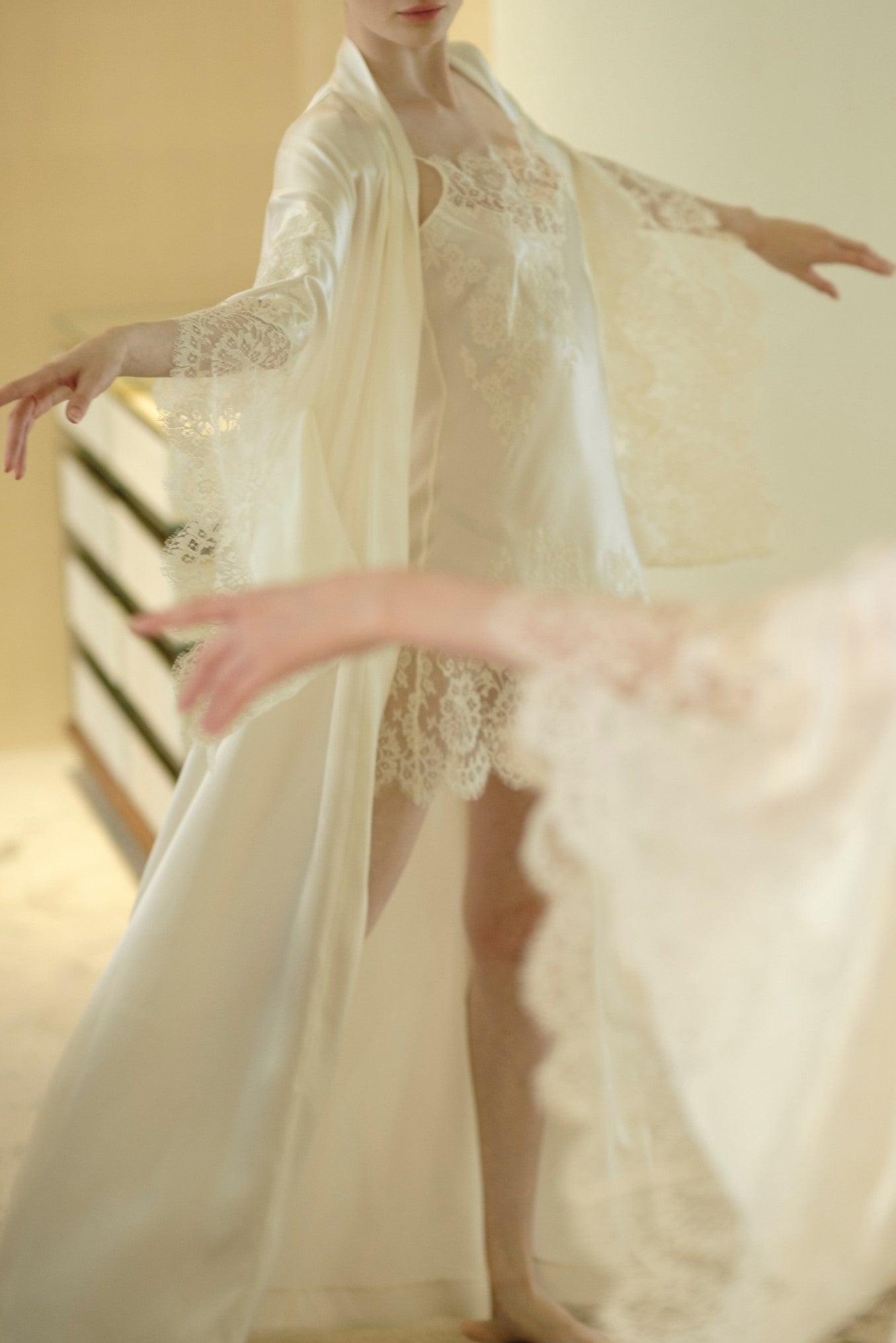 Made of silk and lace, explore the couture collection 2026 Cruise from the house Carine Gilson with this slip babydoll style straight neckline in natural silk  with natural lace