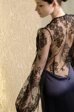 Discover the unique craftmanship of the belgian designer Carine Gilson in her atelier for the 2026 Cruise collection with this Long Déshabillé Cache-Coeur Style Silk Satin in Dark Marine Blue Silk  with black lace