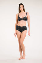 Explore the "basics" lingerie collection from the house Carine Gilson with this Soft Triangle in Black Silk